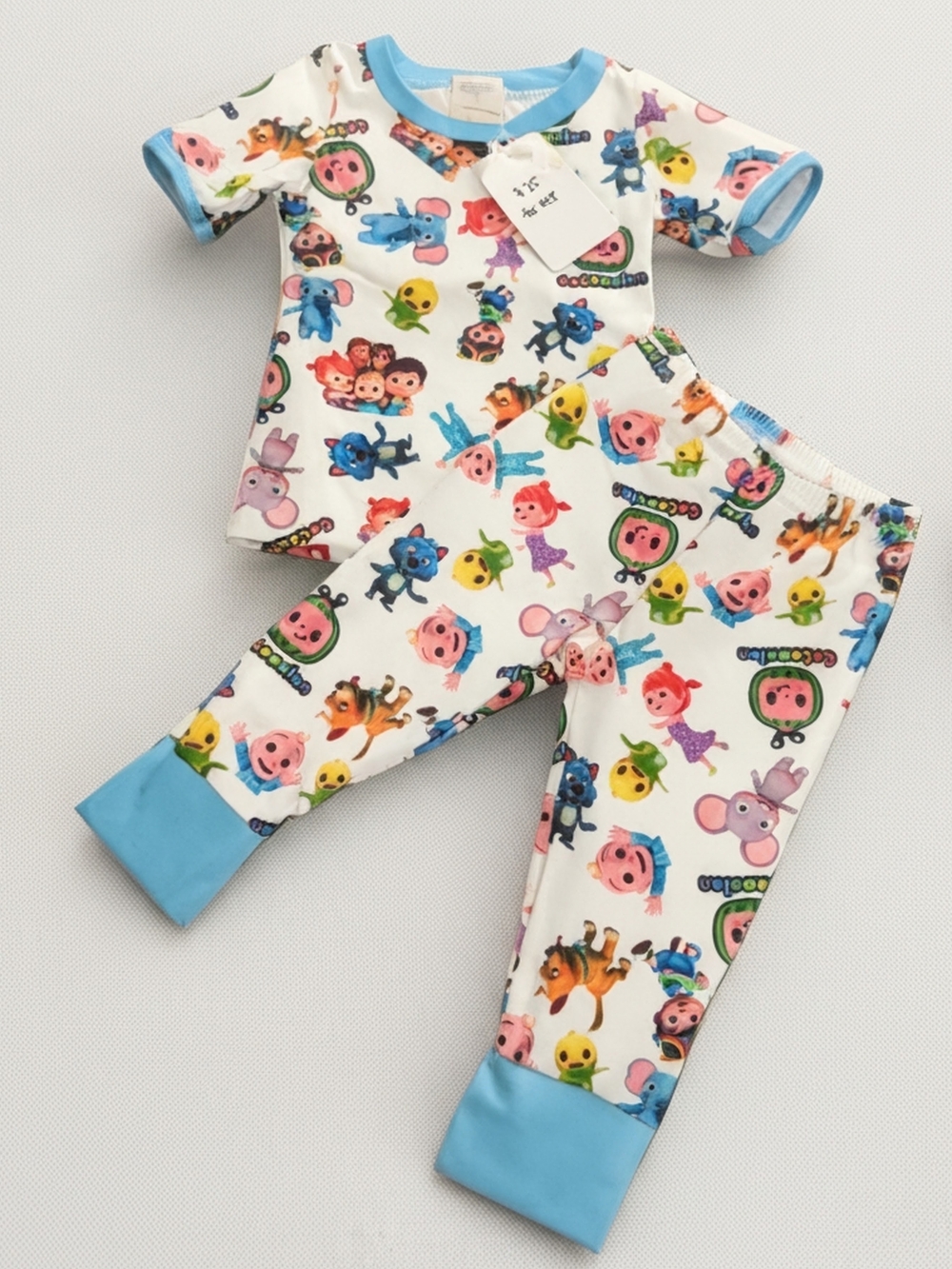 NWT CoComelon Kids Pajama Set - Blue Trim Cartoon Characters. Size 12-18 Months